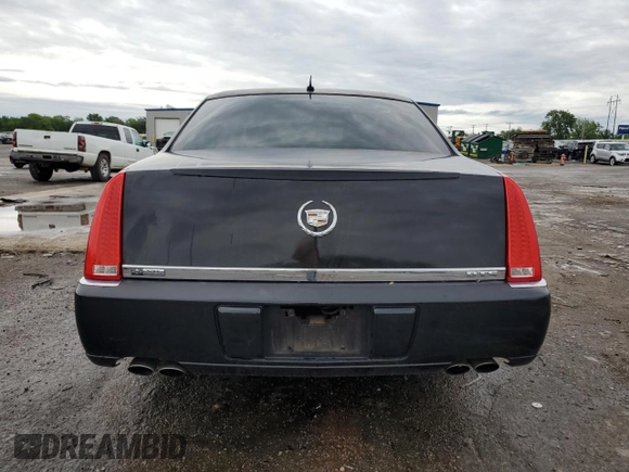 2007 Cadillac DTS V8 z VIN 1G6KD57Y27U179010, wystawiony jako Copart lot #54055605 z przebiegiem 137 326 mil mil oraz Szkoda całkowita • Salvage title. Historia ofert i sprzedaży dostępna na DreamBid. Obrazek 6.