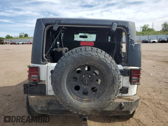 2016 Jeep Wrangler Willys Wheeler z VIN 1C4AJWAG4GL243285, wystawiony jako Copart lot #58035425 z przebiegiem 100 251 mil mil oraz Szkoda całkowita • Salvage title. Historia ofert i sprzedaży dostępna na DreamBid. Obrazek 6.