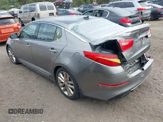 2015 Kia Optima SX Turbo with VIN 5XXGR4A68FG449822, listed as a IAAI auction lot 40480060 with 108,570 mi miles. Bid and sale history available at carsss.com. Image 3.