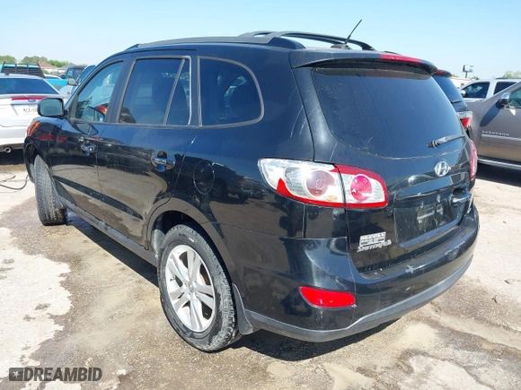 2012 Hyundai Santa Fe Limited with VIN 5XYZK3AB1CG120312, listed as a IAAI auction lot 41855080 with 143,783 mi miles. Bid and sale history available at carsss.com. Image 3.