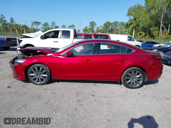 2018 Mazda 6 Grand Touring with VIN JM1GL1TY1J1302146, listed as a IAAI auction lot 41788881 with 55,852 mi miles and . Bid and sale history available at DreamBid. Image 15.