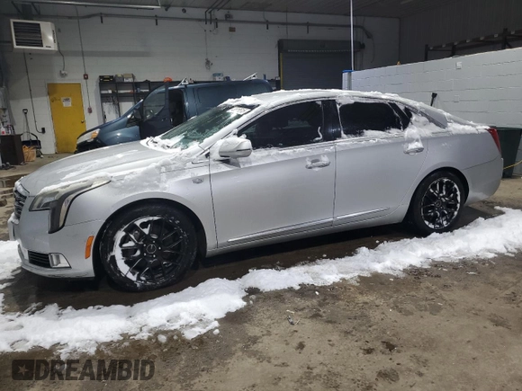 2018 Cadillac XTS Luxury with VIN 2G61M5S36J9138049, listed as a Copart auction lot 43606515 with 180,205 mi miles and Salvage Title. Bid and sale history available at DreamBid. Image 1.