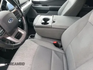 2021 Ford F-150 XL with VIN 1FTFW1E5XMFA73415, listed as a IAAI auction lot 42360380 with 107,350 mi miles and . Bid and sale history available at DreamBid. Image 1.