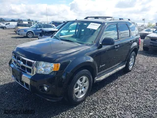 2011 Ford Escape Hybrid with VIN 1FMCU5K37BKA22327, listed as a IAAI auction lot 41906927 with 135,027 mi miles. Bid and sale history available at carsss.com. Image 2.