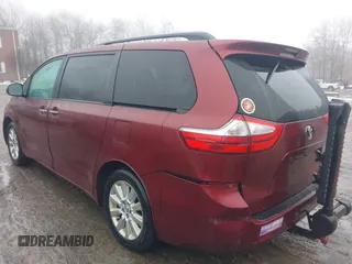 2015 Toyota Sienna Ltd with VIN 5TDDK3DC5FS106080, listed as a IAAI auction lot 41579010 with 133,495 mi miles. Bid and sale history available at carsss.com. Image 3.