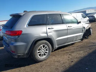2018 Jeep Grand Cherokee Laredo E with VIN 1C4RJEAG9JC126080, listed as a IAAI auction lot 41355941 with 108,919 mi miles and . Bid and sale history available at DreamBid. Image 4.
