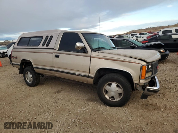 1989 GMC Sierra 1500 with VIN 2GTEK14K0K1565339, listed as a Copart auction lot 83792294 with Not Provided miles and Salvage Title. Bid and sale history available at DreamBid. Image 4.
