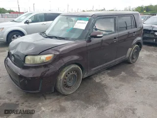2010 Scion xB with VIN JTLZE4FE2A1117808, listed as a IAAI auction lot 41910113 with 242,060 mi miles. Bid and sale history available at carsss.com. Image 2.