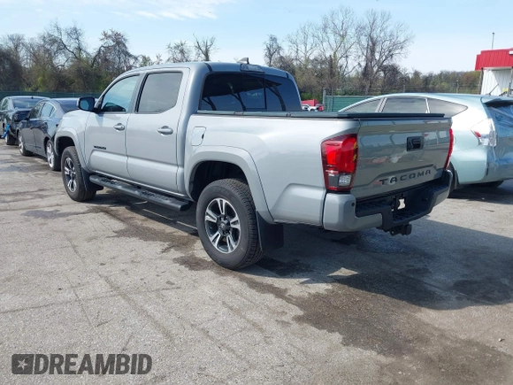 2018 Toyota Tacoma SR with VIN 3TMCZ5AN6JM170128, listed as a IAAI auction lot 42038979 with 59,497 mi miles. Bid and sale history available at carsss.com. Image 3.