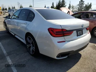 2018 BMW 7 Series 740i with VIN WBA7E2C5XJB214886, listed as a Copart auction lot 57833143 with 39,975 mi miles. Bid and sale history available at carsss.com. Image 2.