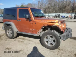 2010 Jeep Wrangler Rubicon with VIN 1J4BA6D17AL208835, listed as a Copart auction lot 41851855 with 107,771 mi miles and Salvage title. Bid and sale history available at DreamBid. Image 4.