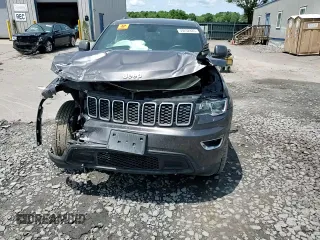 2019 Jeep Grand Cherokee Laredo E z VIN 1C4RJFAG4KC636067, wystawiony jako Copart lot #59232885 z przebiegiem Nie podano mil oraz Szkoda całkowita • Salvage title. Historia ofert i sprzedaży dostępna na DreamBid. Obrazek 14.