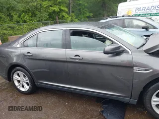 2018 Ford Taurus SEL z VIN 1FAHP2E85JG101221, wystawiony jako IAAI lot #42242127 z przebiegiem 123 787 mil mil oraz . Historia ofert i sprzedaży dostępna na DreamBid. Obrazek 14.