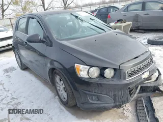 2014 Chevrolet Sonic LT with VIN 1G1JC6SB3E4219055, listed as a IAAI auction lot 41411713 with 76,047 mi miles. Bid and sale history available at carsss.com. Image 1.