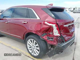 2017 Cadillac XT5 Platinum AWD with VIN 1GYKNFRS9HZ126747, listed as a IAAI auction lot 41810902 with 106,507 mi miles. Bid and sale history available at carsss.com. Image 6.