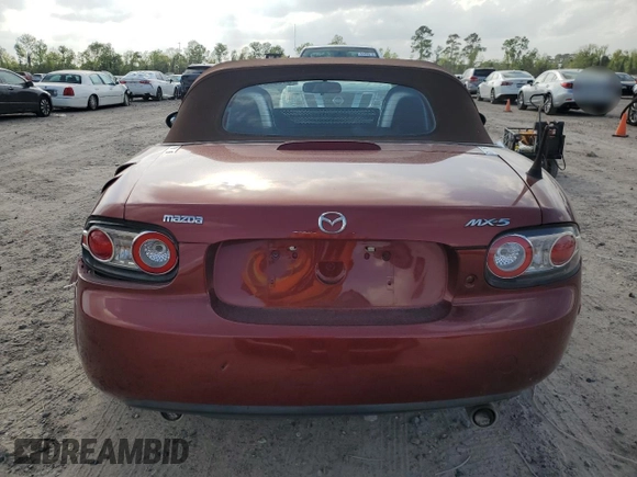 2007 Mazda MX-5 Miata Sport z VIN JM1NC25F270127574, wystawiony jako Copart lot #51538215 z przebiegiem 131 339 mil mil oraz Szkoda całkowita • Salvage title. Historia ofert i sprzedaży dostępna na DreamBid. Obrazek 6.