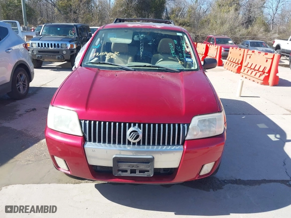 2006 Mercury Mariner Luxury with VIN 4M2YU56136KJ18068, listed as a IAAI auction lot 41776410 with 170,619 mi miles. Bid and sale history available at carsss.com. Image 6.