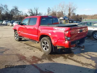 2018 Toyota Tacoma SR with VIN 3TMCZ5ANXJM154305, listed as a IAAI auction lot 41557497 with 182,624 mi miles and . Bid and sale history available at DreamBid. Image 3.