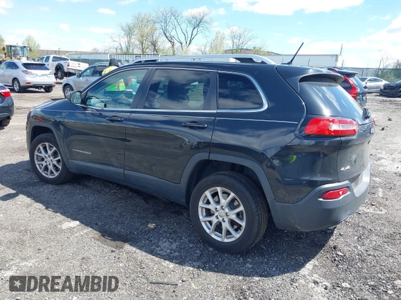 2014 Jeep Cherokee Latitude with VIN 1C4PJMCS8EW257959, listed as a IAAI auction lot 41987529 with 124,749 mi miles. Bid and sale history available at carsss.com. Image 3.