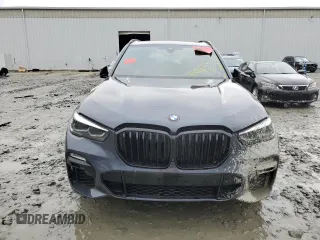 2021 BMW X5 z VIN NJ1541E, wystawiony jako Copart lot #37990264 z przebiegiem 18 321 mil mil oraz Szkoda całkowita • Salvage title. Historia ofert i sprzedaży dostępna na DreamBid. Obrazek 5.