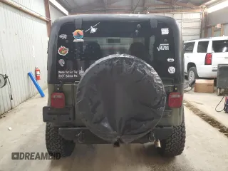 1997 Jeep Wrangler SE with VIN 1J4FY29PXVP476747, listed as a Copart auction lot 49218685 with 165,442 mi miles and Clean Title. Bid and sale history available at carsss.com. Image 6.