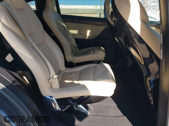 2016 Tesla Model X 70D with VIN 5YJXCBE24GF019450, listed as a IAAI auction lot 41517321 with 96,831 mi miles. Bid and sale history available at carsss.com. Image 8.