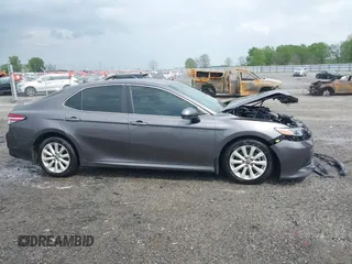 2020 Toyota Camry LE with VIN 4T1C11AK1LU328682, listed as a IAAI auction lot 41966816 with 172,334 mi miles and . Bid and sale history available at DreamBid. Image 13.