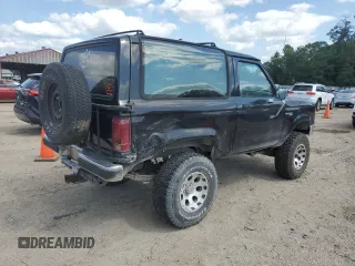 1990 Ford Bronco z VIN 1FMCU14T9LUA15536, wystawiony jako Copart lot #54391815 z przebiegiem 319 124 mil mil oraz Szkoda całkowita • Salvage title. Historia ofert i sprzedaży dostępna na DreamBid. Obrazek 3.