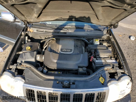 2006 Jeep Grand Cherokee Overland with VIN 1J8HR68256C334929, listed as a Copart auction lot 79450964 with 184,944 mi miles and Salvage Title. Bid and sale history available at carsss.com. Image 13.