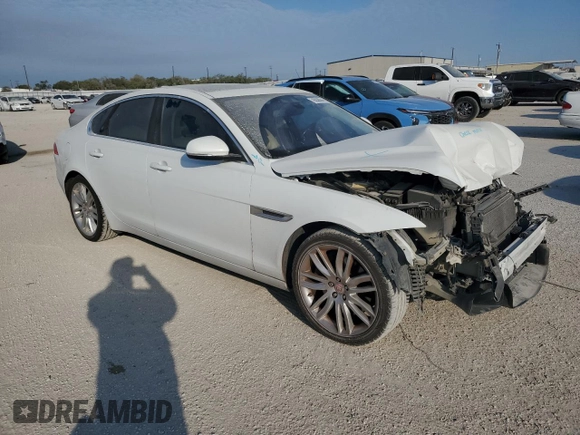 2016 Jaguar XF 35t Prestige with VIN SAJBE4BV5GCY16769, listed as a Copart auction lot 76058864 with 122,649 mi miles and Salvage Title. Bid and sale history available at carsss.com. Image 4.