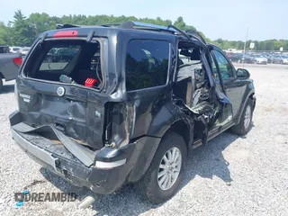 2011 Mercury Mariner Premier with VIN 4M2CN9HG4BKJ00186, listed as a IAAI auction lot 42840165 with 149,700 mi miles and . Bid and sale history available at DreamBid. Image 4.