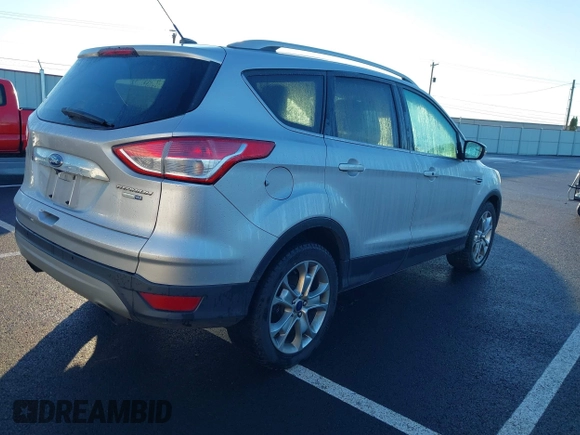 2014 Ford Escape Titanium with VIN 1FMCU9J94EUD01966, listed as a IAAI auction lot 41226043 with 132,730 mi miles. Bid and sale history available at carsss.com. Image 4.