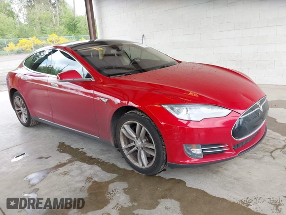 2013 Tesla Model S with VIN 5YJSA1CN7DFP26996, listed as a IAAI auction lot 42244540 with 128,160 mi miles and . Bid and sale history available at DreamBid. Image 1.