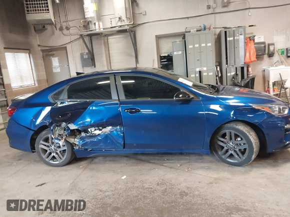 2021 Kia Forte GT-Line z VIN 3KPF34AD2ME330827, wystawiony jako IAAI lot #41967454 z przebiegiem 80 641 mil mil oraz . Historia ofert i sprzedaży dostępna na DreamBid. Obrazek 13.