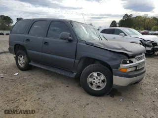 2002 Chevrolet Tahoe LS with VIN 1GNEK13Z52R295084, listed as a Copart auction lot 50594675 with 214,612 mi miles and Salvage Title. Bid and sale history available at carsss.com. Image 4.