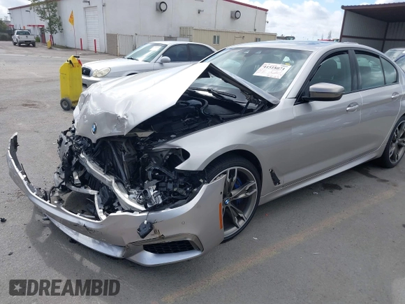 2020 BMW 5 Series M550i xDrive z VIN WBAJS7C07LCD85532, wystawiony jako IAAI lot #41518071 z przebiegiem 57 645 mil mil oraz . Historia ofert i sprzedaży dostępna na DreamBid. Obrazek 17.