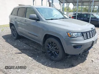2021 Jeep Grand Cherokee Laredo X with VIN 1C4RJFAG5MC654581, listed as a IAAI auction lot 42148174 with 65,985 mi miles and . Bid and sale history available at DreamBid. Image 1.