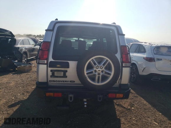 2002 Land Rover Discovery with VIN SALTW12452A769021, listed as a Copart auction lot 71550244 with 83,679 mi miles and Salvage Title. Bid and sale history available at DreamBid. Image 6.