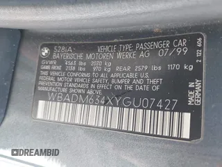 2000 BMW 5 Series 528iA with VIN WBADM634XYGU07427, listed as a IAAI auction lot 42085048 with 192,828 mi miles. Bid and sale history available at carsss.com. Image 9.