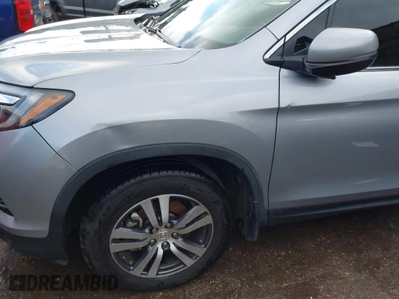 2016 Honda Pilot EX-L with VIN 5FNYF5H53GB040003, listed as a IAAI auction lot 41452374 with Not Provided miles and . Bid and sale history available at DreamBid. Image 6.