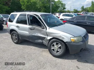 2005 Ford Escape XLS Value with VIN 1FMYU02Z35KD87671, listed as a IAAI auction lot 41880824 with 278,689 mi miles. Bid and sale history available at carsss.com. Image 1.