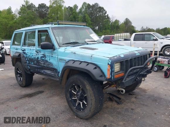 1997 Jeep Cherokee SE z VIN 1J4FJ28S3VL573144, wystawiony jako IAAI lot #41965201 z przebiegiem 298 276 mil mil oraz . Historia ofert i sprzedaży dostępna na DreamBid. Obrazek 1.