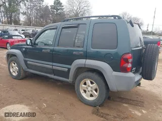 2005 Jeep Liberty Sport with VIN 1J4GL48525W655627, listed as a IAAI auction lot 41621988 with 186,585 mi miles. Bid and sale history available at carsss.com. Image 3.