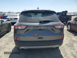 2021 Ford Escape SEL Hybrid with VIN 1FMCU0CZ4MUB20681, listed as a Copart auction lot 68497004 with 15,279 mi miles and Salvage title. Bid and sale history available at DreamBid. Image 6.