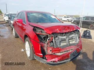 2021 Cadillac XT5 FWD Luxury with VIN 1GYKNAR45MZ125383, listed as a IAAI auction lot 41685947 with 64,997 mi miles. Bid and sale history available at carsss.com. Image 6.
