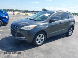 2016 Ford Escape SE with VIN 1FMCU0GXXGUB66870, listed as a IAAI auction lot 42219454 with 116,158 mi miles and . Bid and sale history available at carsss.com. Image 2.