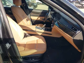 2012 BMW 7 Series 740i with VIN WBAKA4C51CC613636, listed as a IAAI auction lot 41908801 with 127,725 mi miles and . Bid and sale history available at carsss.com. Image 5.