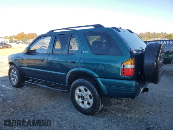 1999 Isuzu Rodeo S с VIN 4S2CK58W6X4352441, выставлен на аукционе Copart как лот 81915384 с пробегом 338 513 миль миль и На запчасти • Non repairable. История ставок и продаж доступна на DreamBid. Изображение 2.