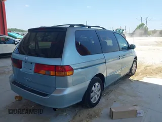 2003 Honda Odyssey EX with VIN 5FNRL18623B137962, listed as a IAAI auction lot 42155182 with 117,034 mi miles and . Bid and sale history available at DreamBid. Image 4.