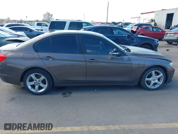 2014 BMW 3 Series 320i xDrive with VIN WBA3C3C58EF983816, listed as a IAAI auction lot 41949430 with 111,627 mi miles. Bid and sale history available at carsss.com. Image 13.